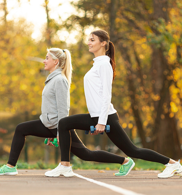 Two people jogging outdoors